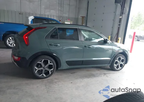 2023 Kia Niro Ex Touring z USA, uszkodzony, nr VIN KNDCR3LE7P5047244